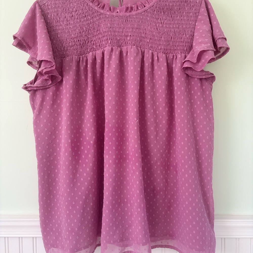 Soft Pink Blouse with Ruffle Sleeves and Textured Fabric